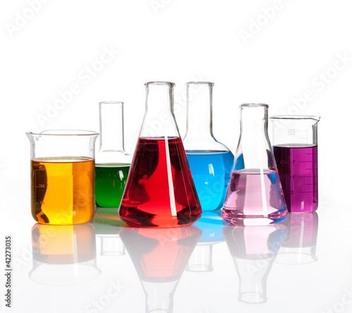 Obraz na plátne Set of laboratory flasks with a colored reagents, isolated