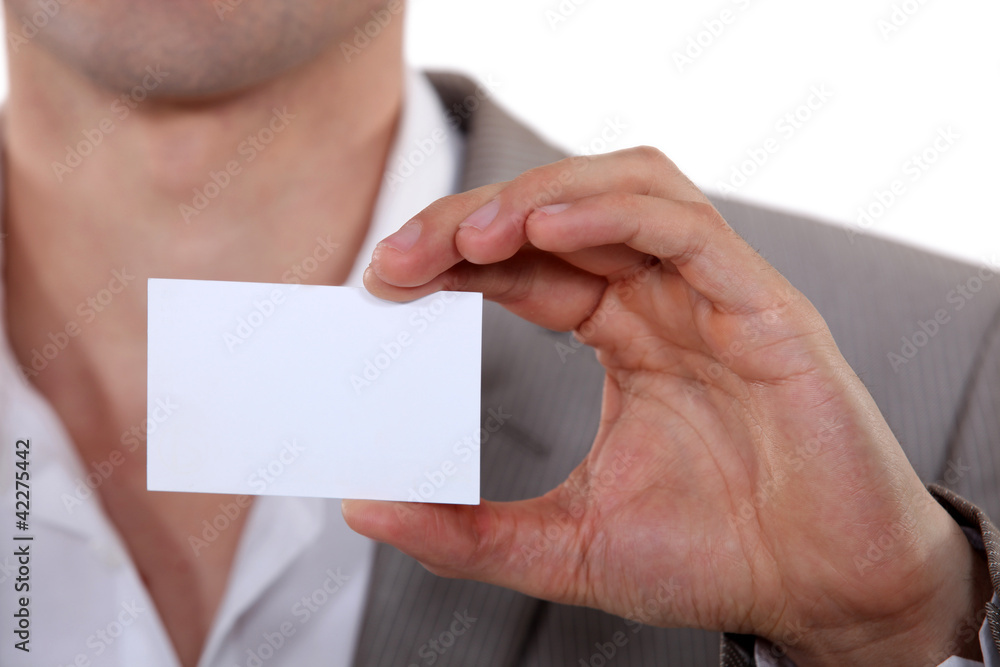 Executive with a blank business card Executive with a blank business card