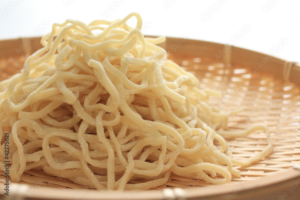 Raw Ramen noodles on bamboo basket Raw Ramen noodles on bamboo basket