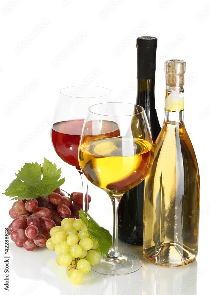 Fototapeta premium bottles and glasses of wine and ripe grapes isolated on white