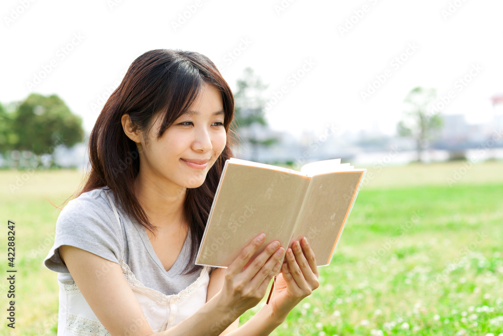 Beautiful young woman in the park. Portrait of asian. Beautiful young woman in the park. Portrait of asian.