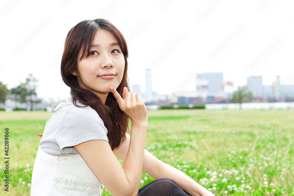 Beautiful young woman in the park. Portrait of asian. Beautiful young woman in the park. Portrait of asian.