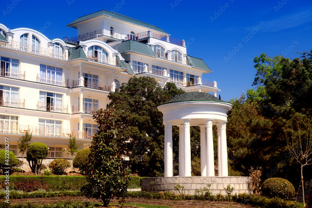 White classical gazebo and summer hotel resort