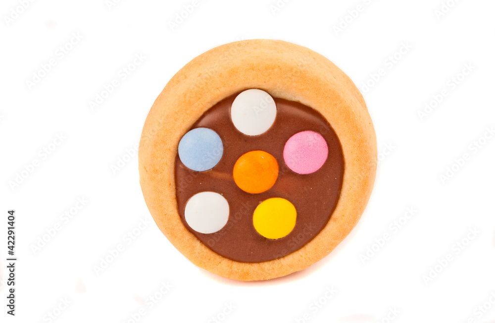 Biscuits with milk chocolate and coloured chocolate beans isolat Biscuits with milk chocolate and coloured chocolate beans isolat