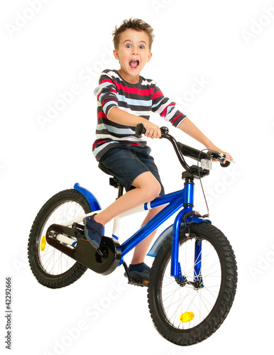 Excited little boy on bike