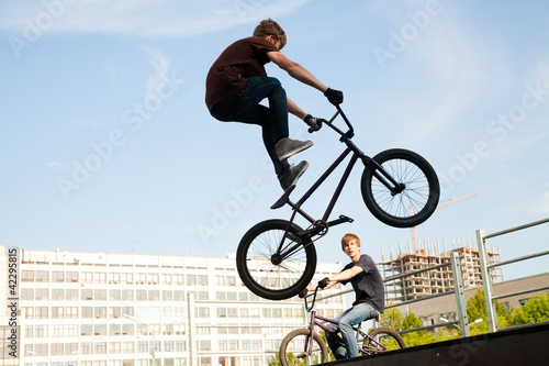 BMX bicycler over ramp