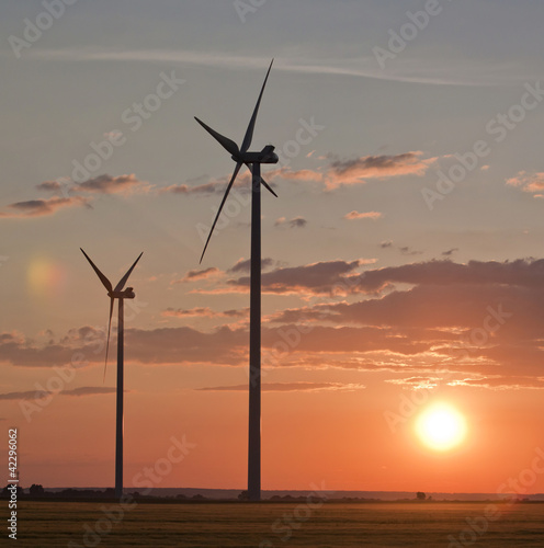 Wind turbines over the sunset