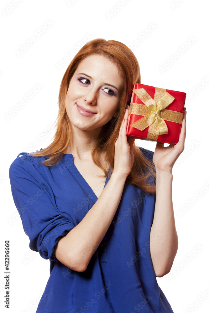 Beautiful red-haired girl with present box. Beautiful red-haired girl with present box.
