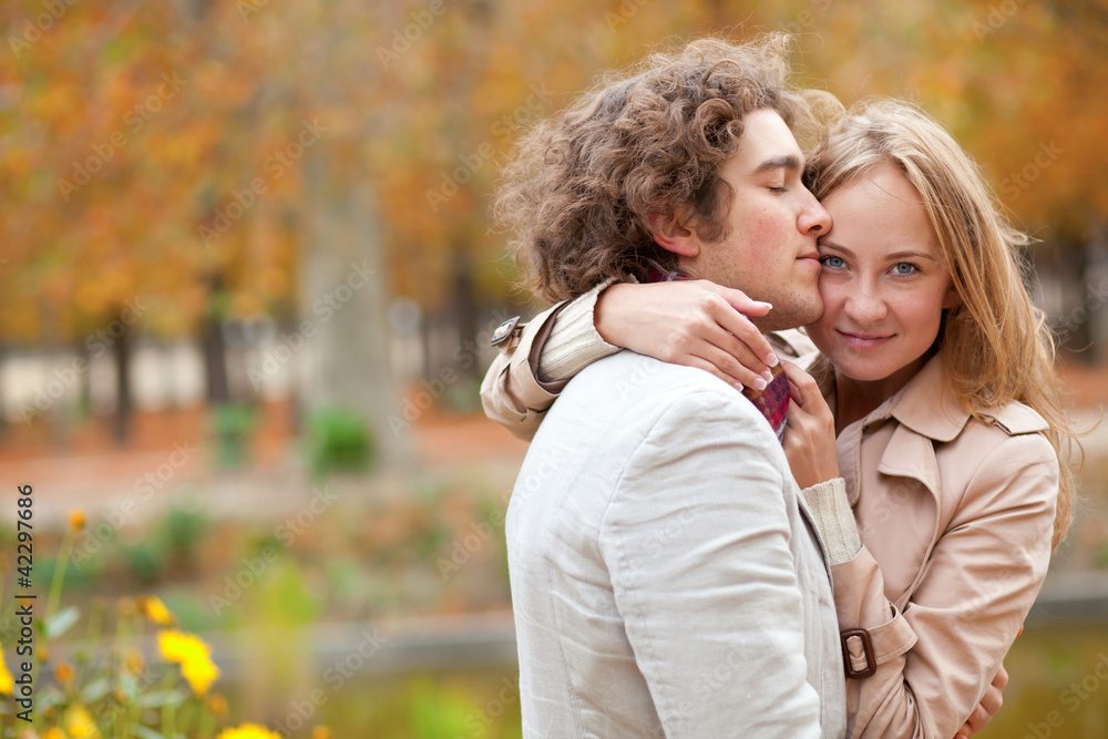 Romantic couple at fall, having a date Romantic couple at fall, having a date
