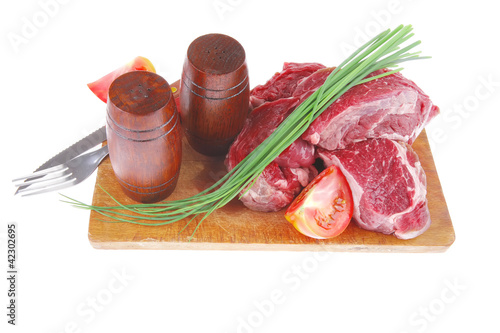 meat portion: bloody beef fillet on plate photo