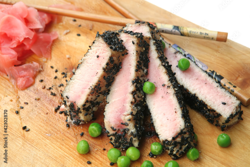 roast tuna sliced on wood roast tuna sliced on wood
