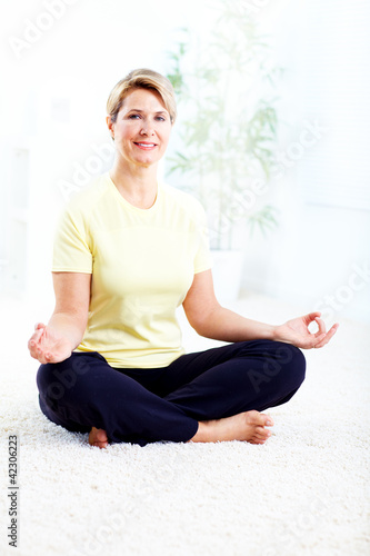 Senior woman doing yoga.