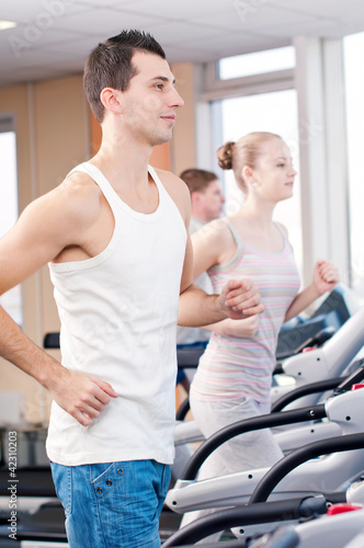 Man at the gym exercising. Run. © mr.markin