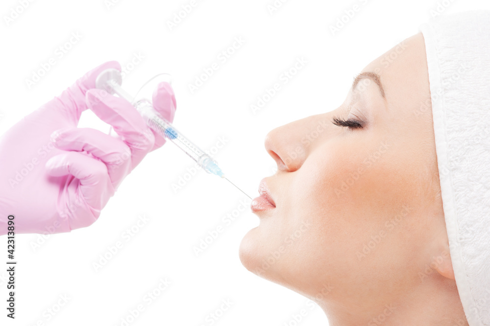 Portrait of a young woman on a botox injection procedure Portrait of a young woman on a botox injection procedure