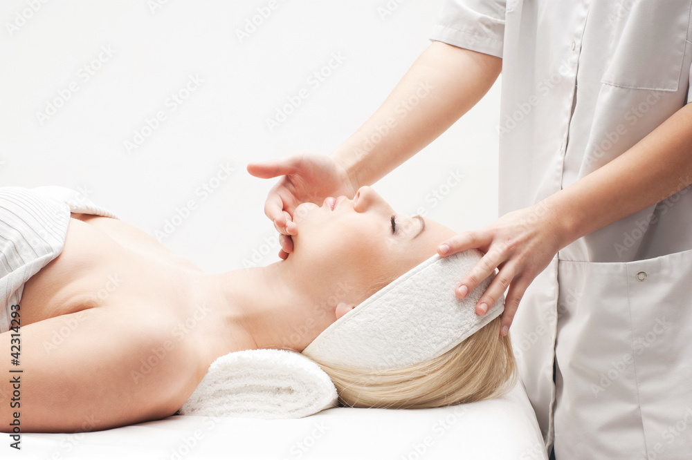 Portrait of a young woman laying on a spa procedure Portrait of a young woman laying on a spa procedure