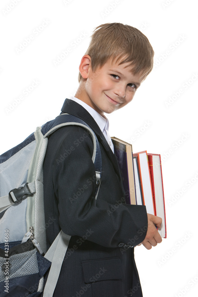 Boy holding books