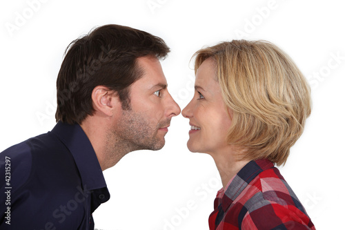 Couple with noses together