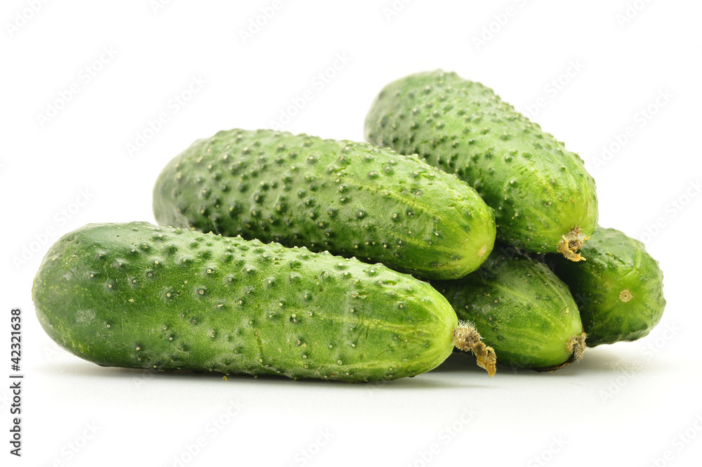 Fresh raw cucumbers isolated on white Fresh raw cucumbers isolated on white