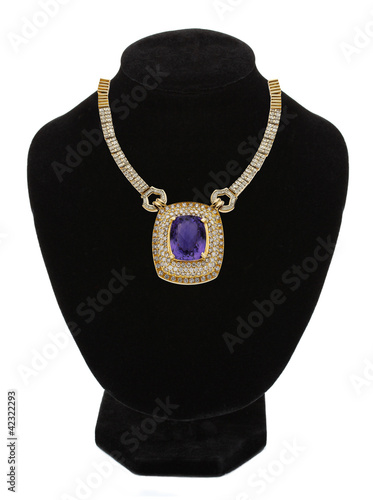 beautiful gold jewellery necklace with violet stone on black man