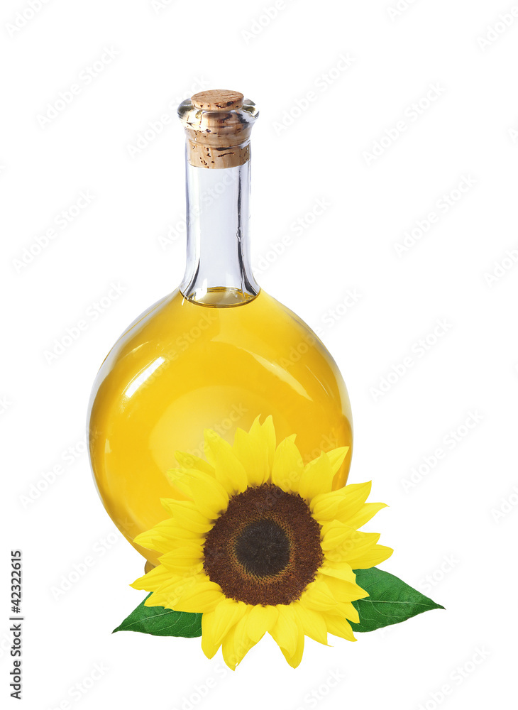 oil in bottle and sunflower isolated on white oil in bottle and sunflower isolated on white