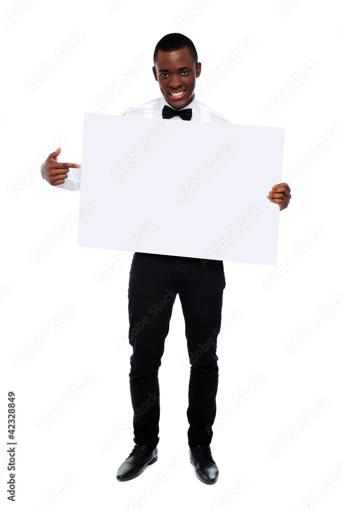 Guy indicating towards blank whiteboard Guy indicating towards blank whiteboard