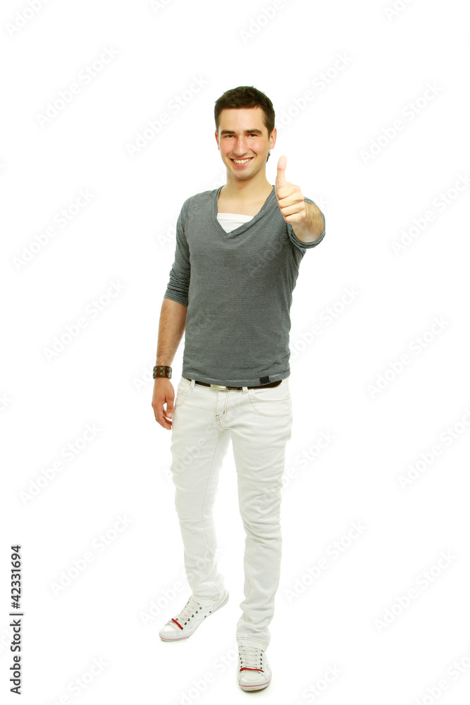 A smiling man showing thumb up sign, isolated on white A smiling man showing thumb up sign, isolated on white