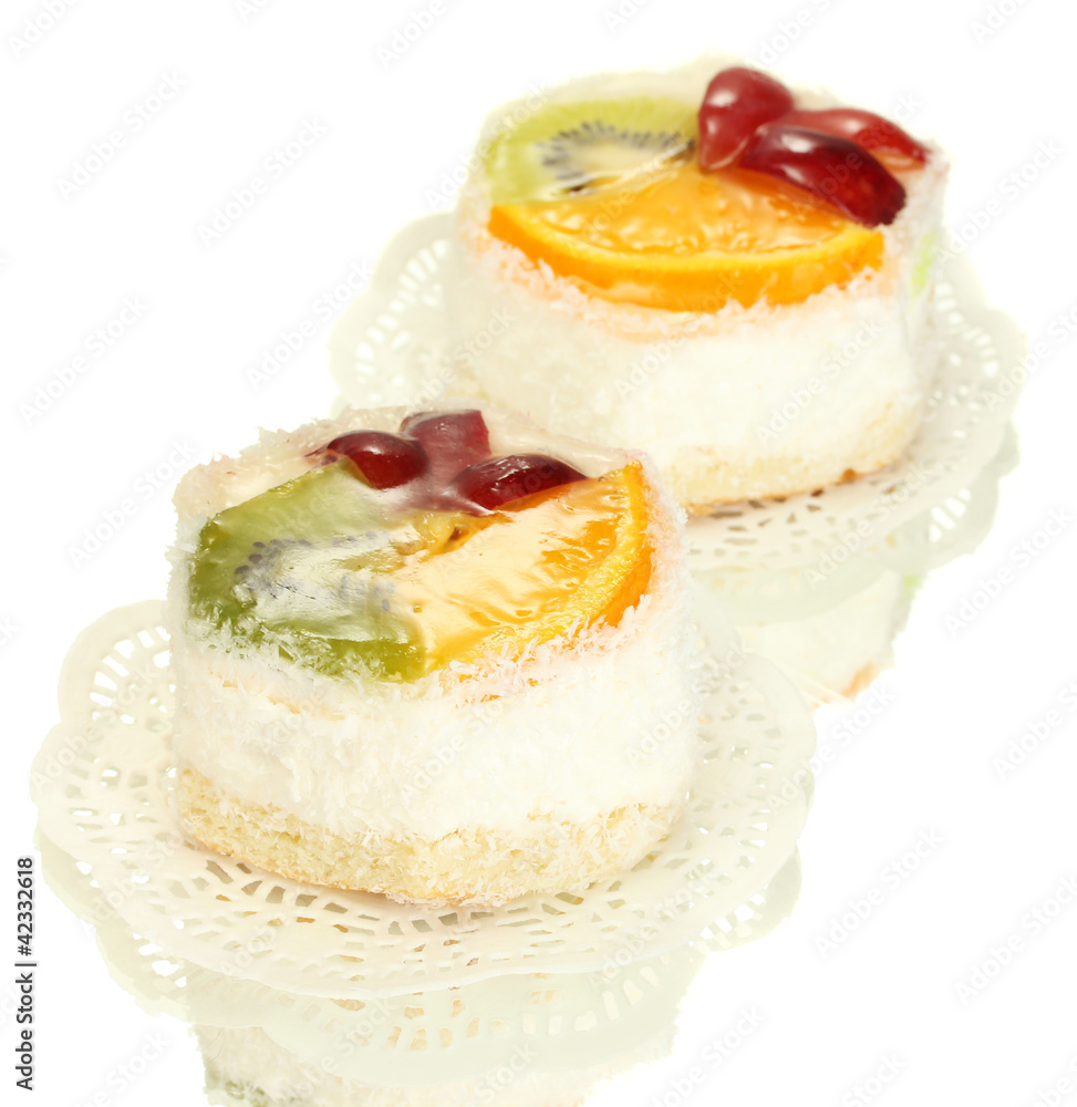 sweet cakes with fruits isolated on white sweet cakes with fruits isolated on white