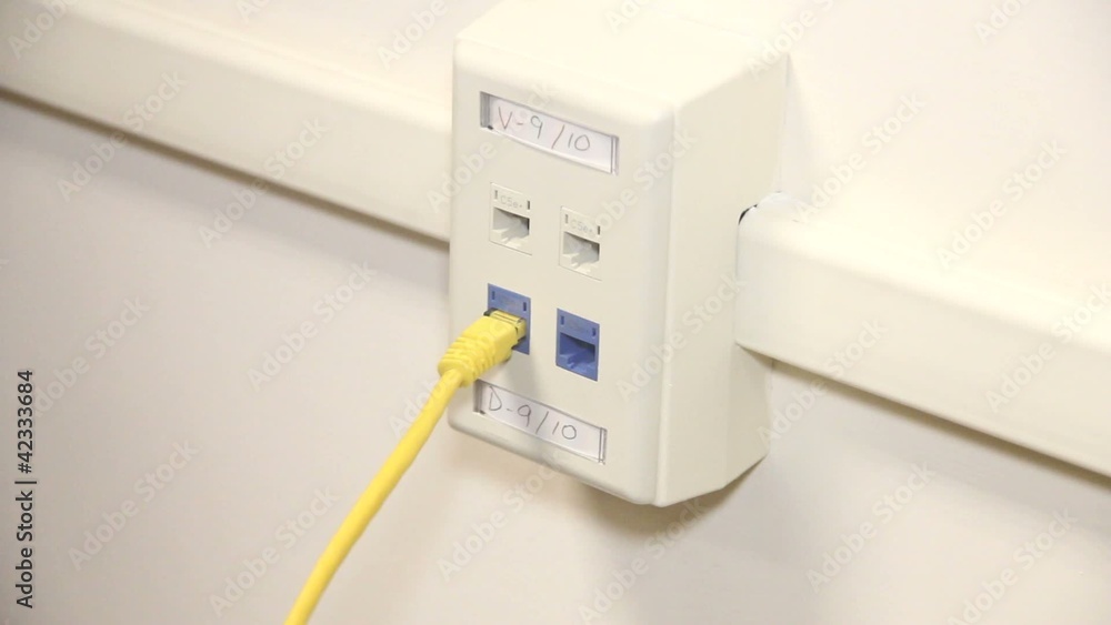 Fumbling And Fitting Network Cable Into Wall Box Jack Fumbling And Fitting Network Cable Into Wall Box Jack