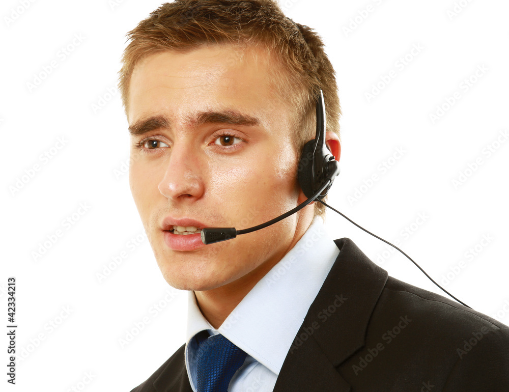 A customer support operator with a headset isolated on white A customer support operator with a headset isolated on white