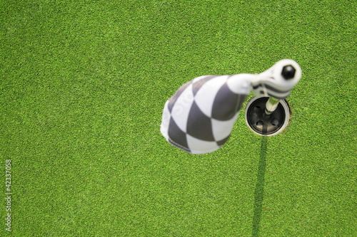 golf hole flag on a field