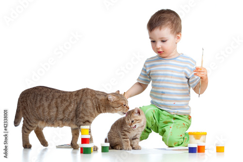 painting kid with mother an...
