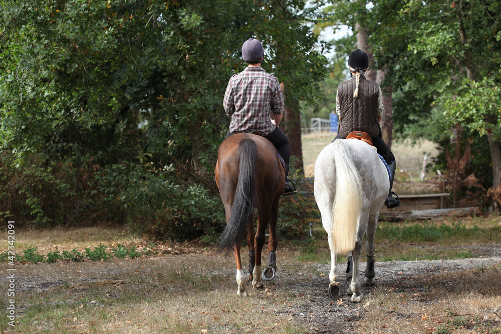 Couple riding in the countryside Couple riding in the countryside