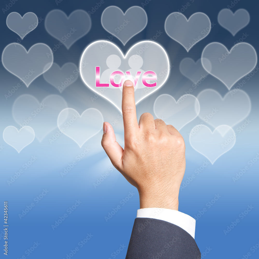 pushing love button on a touch screen interface pushing love button on a touch screen interface