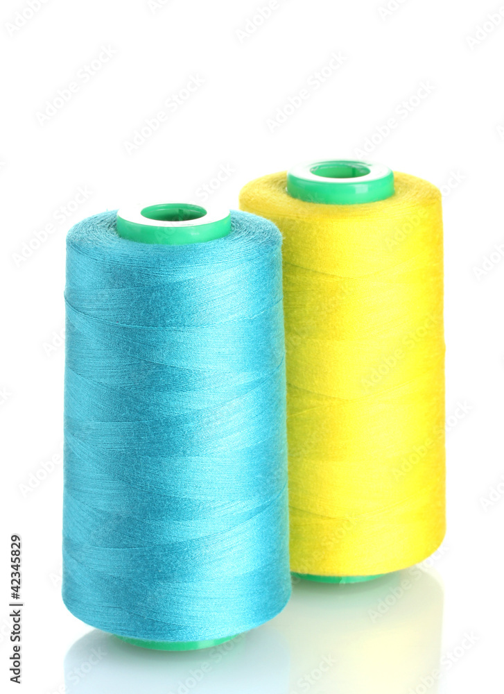 Bobbins of thread isolated on white Bobbins of thread isolated on white