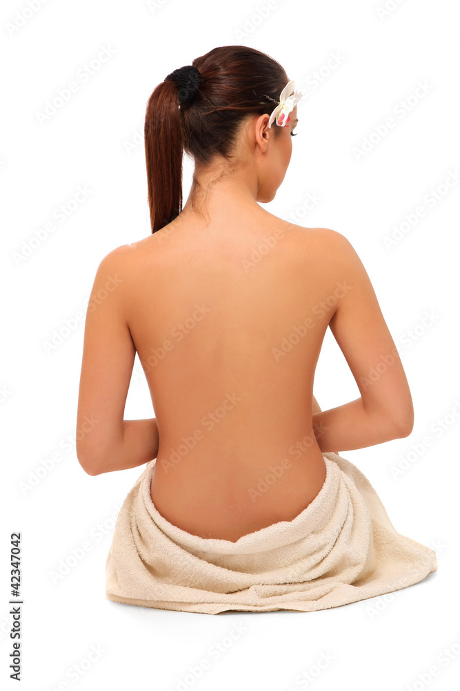 picture of beautiful lady with wite towels on white sand picture of beautiful lady with wite towels on white sand