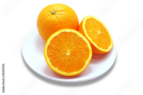 Sliced orange fruit segments isolated on white background