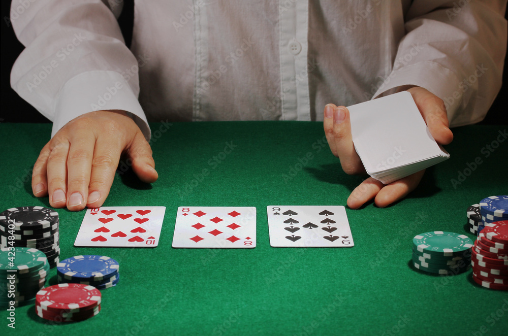 Poker setting on green table Poker setting on green table