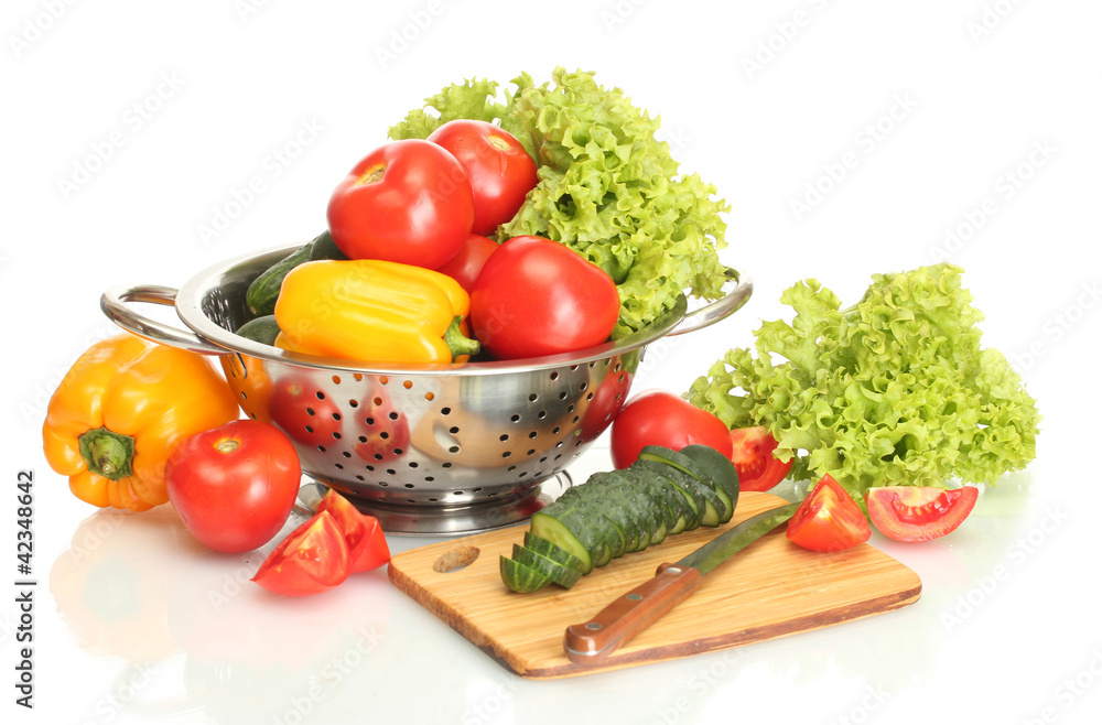 fresh vegetables and knife on cutting board isolated on white fresh vegetables and knife on cutting board isolated on white