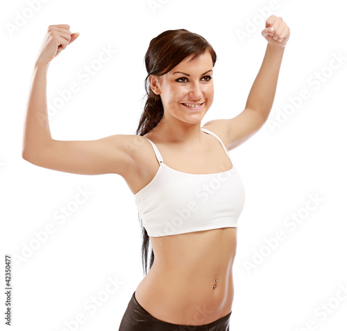 A smiling woman showing her biceps, isolated on white © lenets_tan
