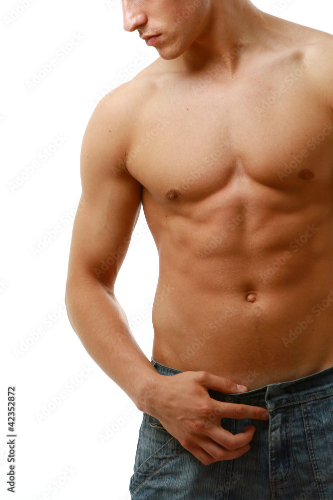 Muscular man , isolated on brown background