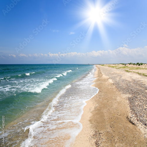 Deserted sunny beach