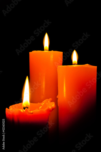 Group of three candles lights