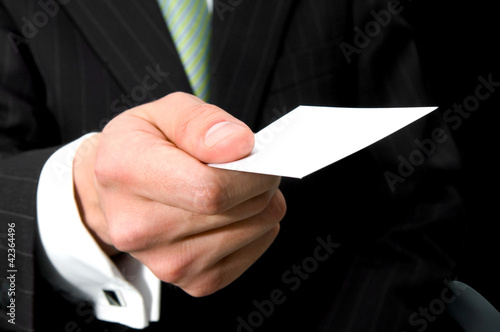 Business man giving his business card
