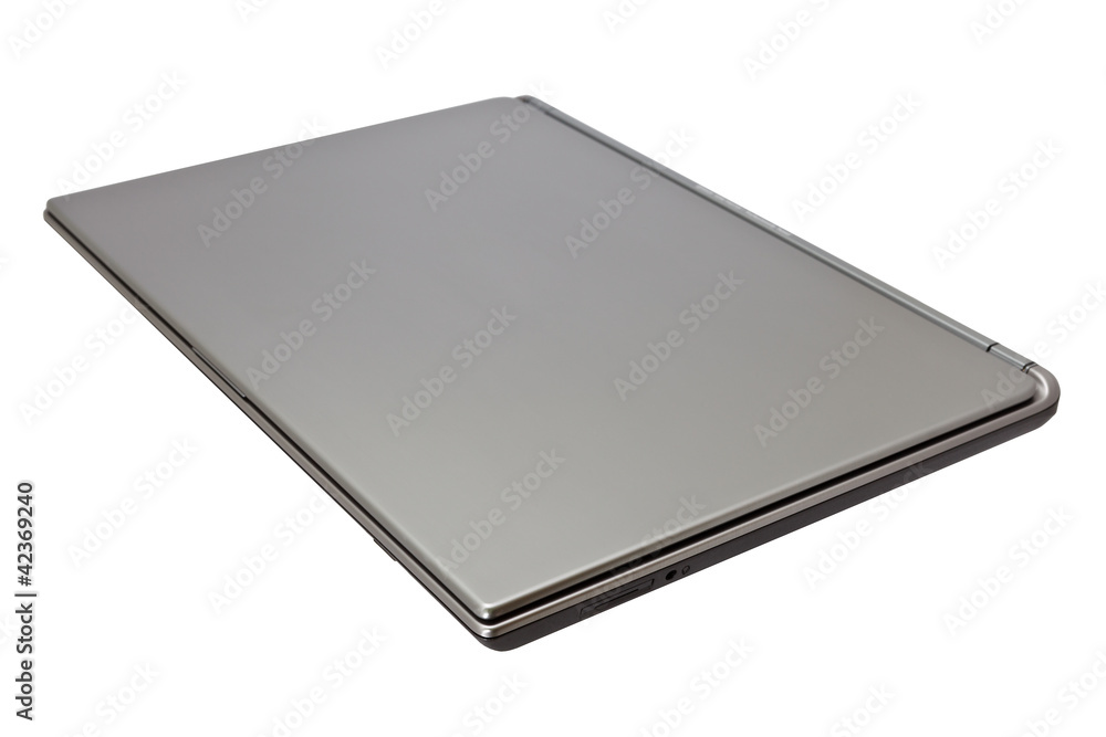 Closed notebook computer on white background Closed notebook computer on white background