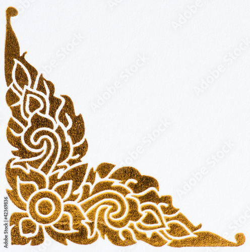 golden thai style pattern on wall