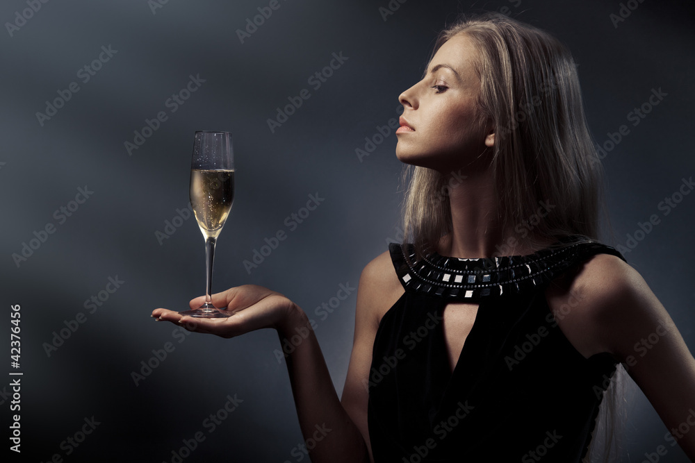 Woman with wine glass in hand Woman with wine glass in hand