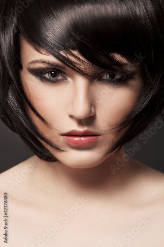 Fototapeta Naklejka Na Ścianę i Meble -  Beautiful Brunette Girl.Healthy Hair.Hairstyle.
