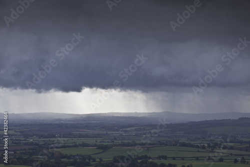 Heavy rain above the Devon countryside