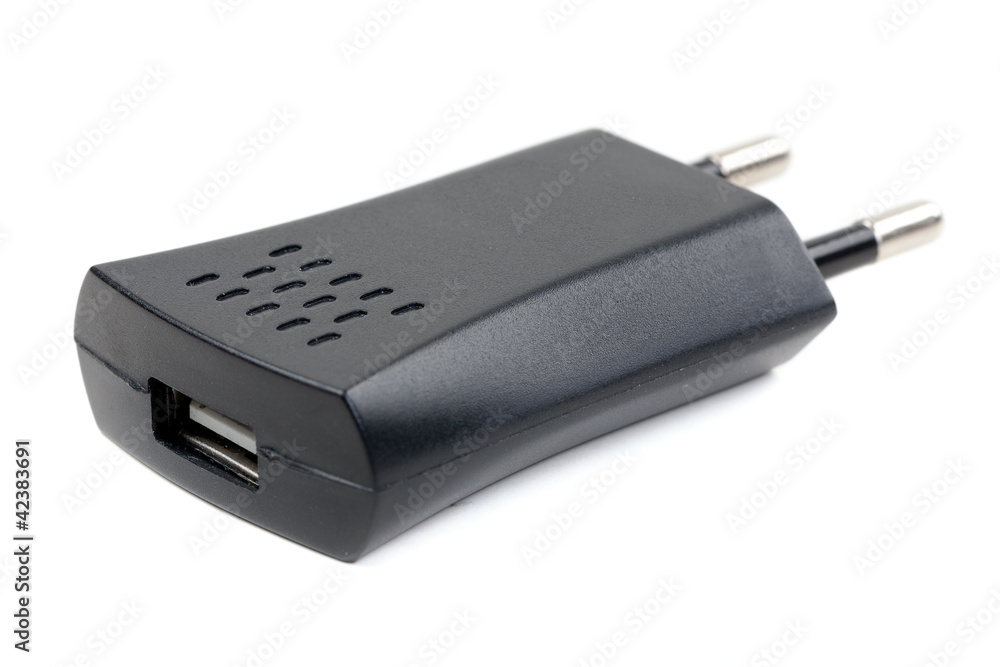 Black USB charger device isolated on white Black USB charger device isolated on white