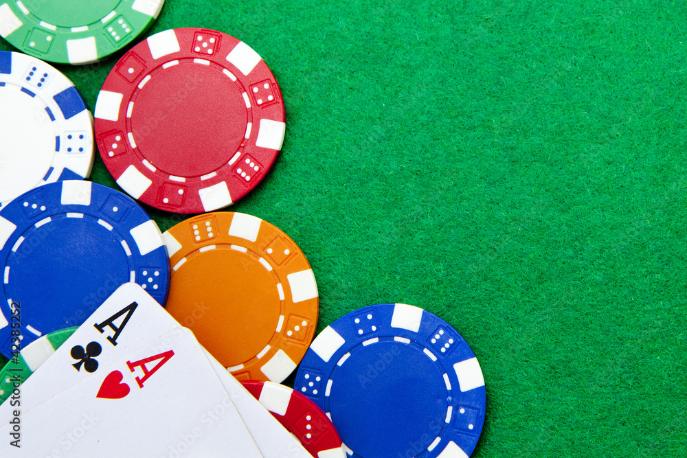 Texas holdem pocket aces on casino table with copy space and chi Texas holdem pocket aces on casino table with copy space and chi